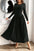 Ruched round neck long sleeve dress in black with moderate stretch.