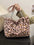 Faux Fur Leopard Shoulder BagMyMooiaTrendsiBag size: Large
Material: Faux fur, Polyester
Imported
Product Measurements (Measurements by inches) &amp; Size Conversion

Size
Actual Length
Actual Width
Actual HeFaux Fur Leopard Shoulder Bag