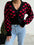 Valentine’s Day heart V-neck cropped cardigan, black with red hearts, slightly stretchy, 100% acrylic.