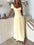 Devine Sweetheart Neck Short Sleeve Maxi Dress in pale yellow with tied and ruched design.