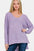 Zenana High-Low Center Seam V-Neck Sweater in lavender, featuring ribbed texture and exposed seams.