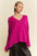 Davi & Dani ribbed side slit V-neck sweater in magenta with exposed seams.