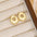 18K Gold-Plated Bubble Letter Stud EarringsMyMooiaTrendsiPieces: 1-pair
Material: 18K gold-plated, Copper
Care instructions: Avoid wearing during exercise, as sweat will react with the jewelry to produce silver chloride an18K Gold-Plated Bubble Letter Stud Earrings