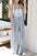 Frayed exposed seam wide leg denim overalls with raw hem.