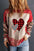 Heart Leopard Round Neck Sweatshirt with plaid heart design and leopard print sleeves.