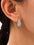 Stainless steel inlaid zircon teardrop earrings on ear, 18K gold-plated.