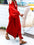 Long sleeve red maxi shirt dress made of cotton with button-down design.