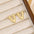 18K Gold-Plated Bubble Letter Stud EarringsMyMooiaTrendsiPieces: 1-pair
Material: 18K gold-plated, Copper
Care instructions: Avoid wearing during exercise, as sweat will react with the jewelry to produce silver chloride an18K Gold-Plated Bubble Letter Stud Earrings