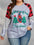 Plus size Christmas tree plaid round neck long sleeve T-shirt with festive design.