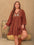 Plus size embroidered tie neck balloon sleeve mini dress in brown with ruffled hem.