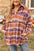 Plus size plaid collared neck long sleeve jacket with pockets, orange and purple tones.