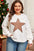 Plus size long sleeve blouse with studded star design and round neck.