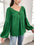 Plus size green V-neck long sleeve top with textured fabric.