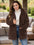 Plus size brown hooded outerwear with long sleeves and front pockets.