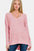 Zenana High-Low Center Seam V-Neck Sweater in pink, featuring ribbed texture and modern high-low hemline.